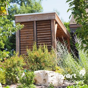 Aménagement paysager Divonne Pays-de-gex Univert Coccinelle piscine terrasse grès cérame abri mur plantations fruitiers arbres fleurs jardin