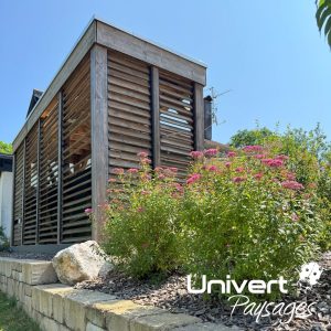 Aménagement paysager Divonne Pays-de-gex Univert Coccinelle piscine terrasse grès cérame abri mur plantations fruitiers arbres fleurs jardin