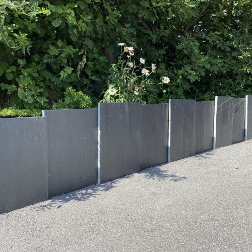 Mur muret soutènement plaques ardoise noire paysagiste pays de gex terrassement décoration jardin